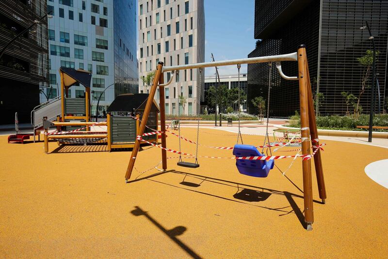 A public playground is cordoned off as it remains closed amid a national lockdown in Barcelona.   AFP