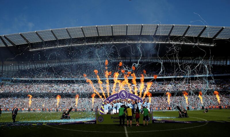Manchester City players celebrate winning the Premier League title. Carl Recine / Reuters