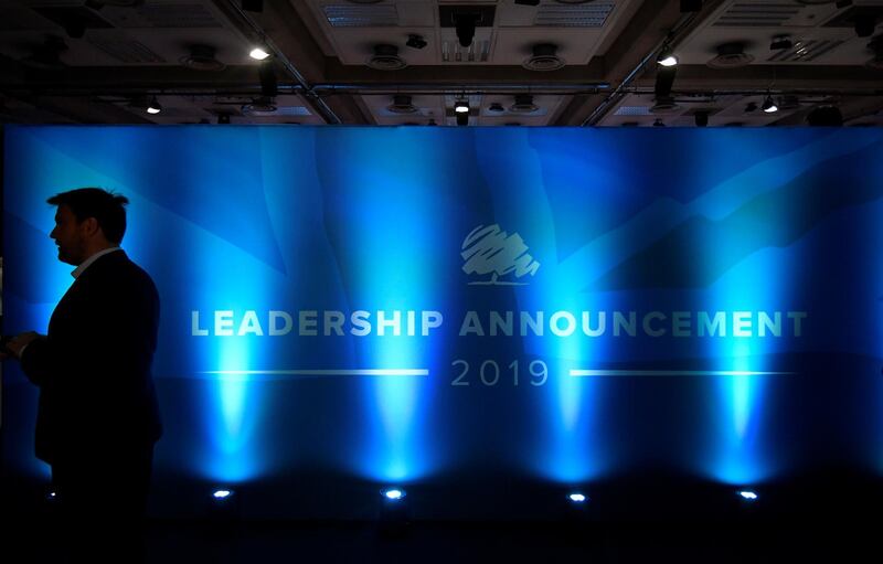 A man waits at the venue of the announcement of Britain's next Prime Minister at The Queen Elizabeth II centre in London. Reuters