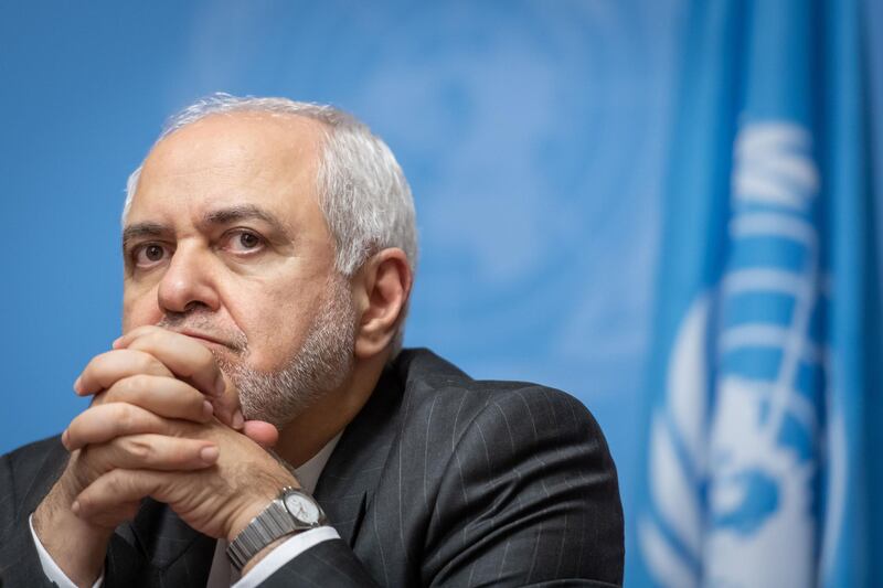 Iranian Foreign Minister Mohammad Javad Zarif looks on as he attends  a press conference on a meeting of the Syria constitution-writing committee on October 29, 2019 at the United Nations Offices in Geneva. / AFP / FABRICE COFFRINI
