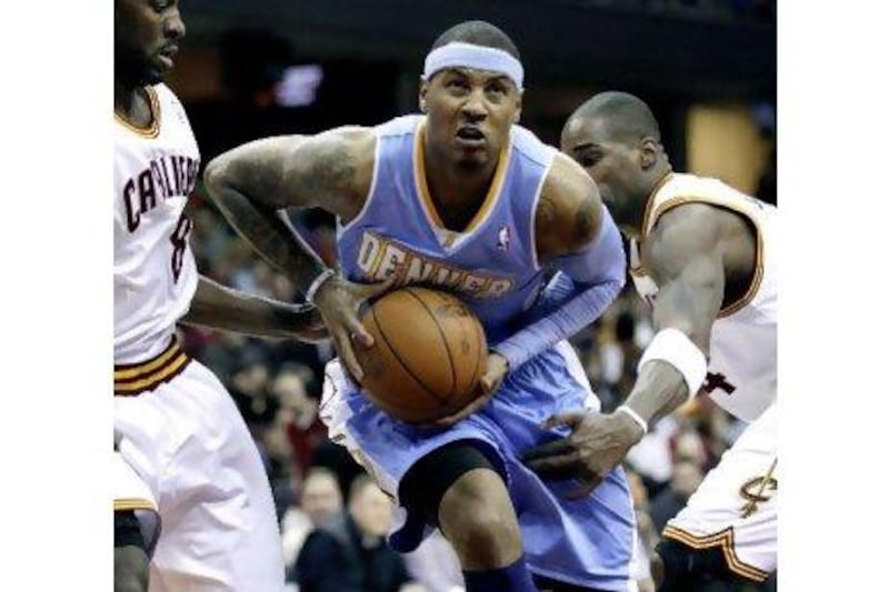 Carmelo Anthony is widely expected to be playing for the New York Knicks soon. Amy Sancetta / AP Photo