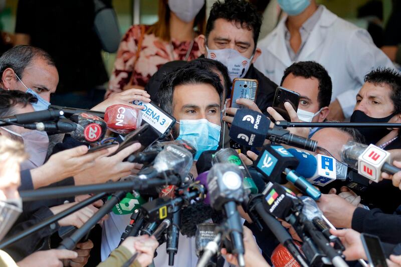 Leopoldo Luque, the personal physician of Argentina football great Diego Maradona, is interviewed by the media outside the clinic after the 60-year-old underwent brain surgery for a blood clot, in Buenos Aires province, on Wednesday, November 4, AFP