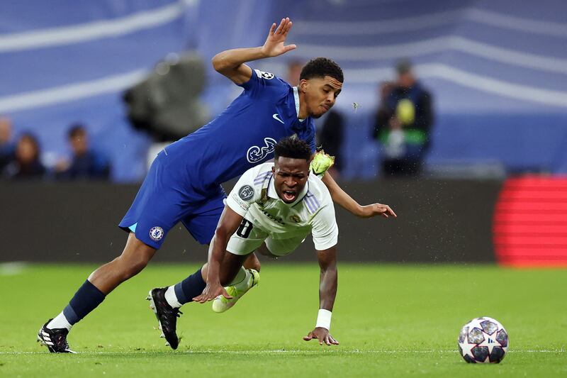 Chelsea defender Wesley Fofana  battles with Real Madrid's Vinicius Junior. AFP