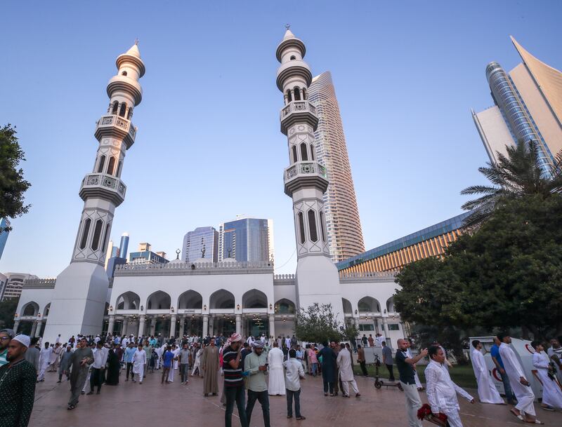 People gather for morning prayers at the Sheikh Khalifa bin Zayed the First Mosque in Abu Dhabi on Friday. Victor Besa / The National