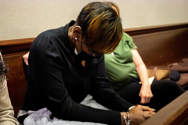 Ahmaud Arbery's mother, Wanda Cooper-Jones, reacts to autopsy photos entered into evidence during the trial. Reuters