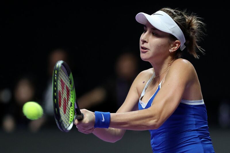 Belinda Bencic plays a backhand against Kiki Bertens during their WTA Finals clash in Shenzhen. Getty Images