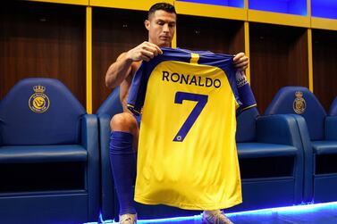 A handout photo made available by the Saudi Al-Nassr Club on 04 January 2023 shows Al-Nassr's new Portuguese forward Cristiano Ronaldo holding his jersey ahead of a presenting ceremony in Riyadh, Saudi Arabia, 03 January 2023.  Cristiano Ronaldo is presented at Mrsool Park stadium on 03 January after he signed a contract for Al-Nassr FC until 2025.   EPA / AL-NASSR CLUB HANDOUT  HANDOUT EDITORIAL USE ONLY / NO SALES