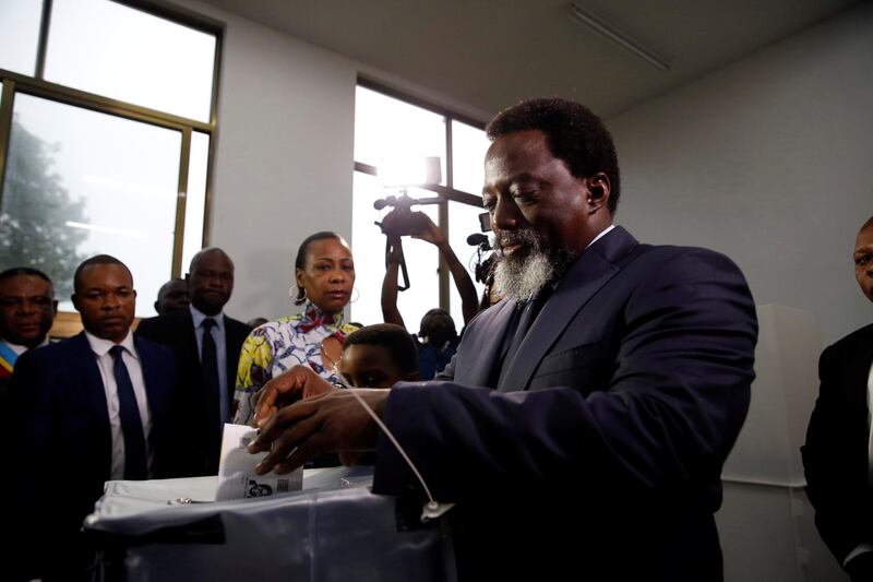 Democratic Republic of Congo's President Joseph Kabila casts his vote at a polling station in Kinshasa, Democratic Republic of Congo, December 30, 2018. REUTERS/Baz Ratner