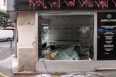 A damaged shop following in Montreuil, near Paris. EPA / Julien Mattia