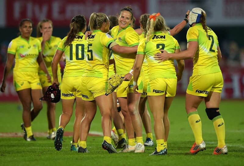 DUBAI, UNITED ARAB EMIRATES - DECEMBER 01:  Players of Australia Rugby Sevens Women's team celebrate their win against United States during the final match beetween Australia and United States on Day Two of the Emirates Dubai Rugby Sevens - HSBC Sevens World Series at The Sevens Stadium on December 1, 2017 in Dubai, United Arab Emirates.  (Photo by Tom Dulat/Getty Images)