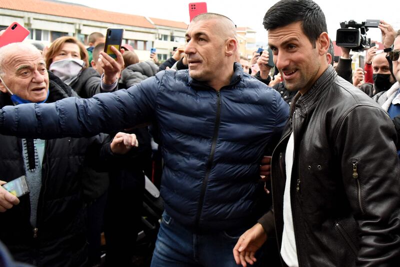 Novak Djokovic is surrounded by fans as he arrives for a ceremony in the coastal city of Budva, where he was declared an honorary citizen. AFP