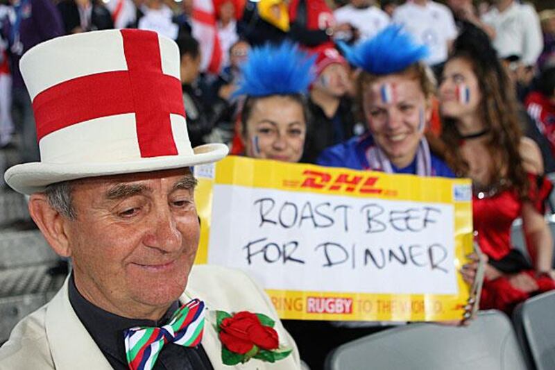 French supporters taunt Peter Cross, the England mascot, during Frances 19-12 quarter-final victory at the Rugby World Cup.

David Rogers / Getty Images