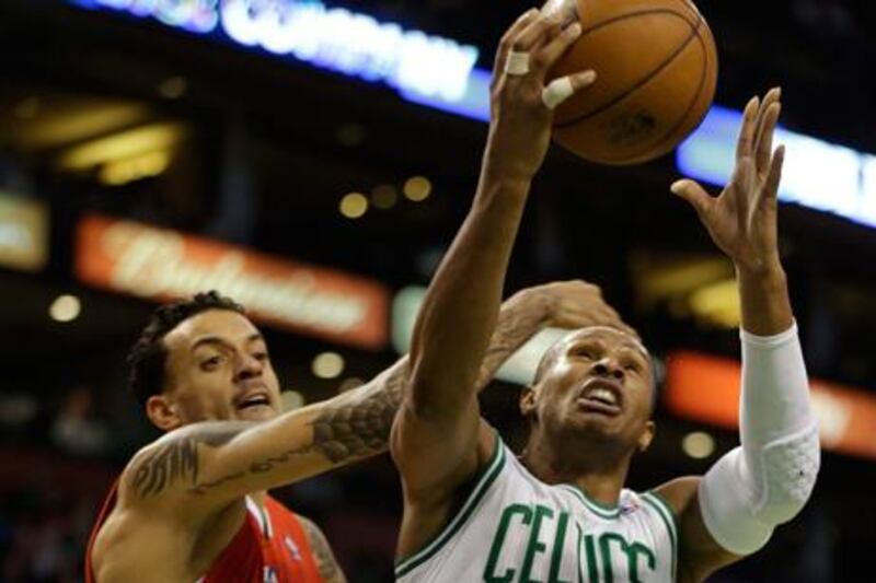 Boston's Leandro Barbosa drives towards the basket under pressure from Matt Barnes of the Los Angeles Clippers.