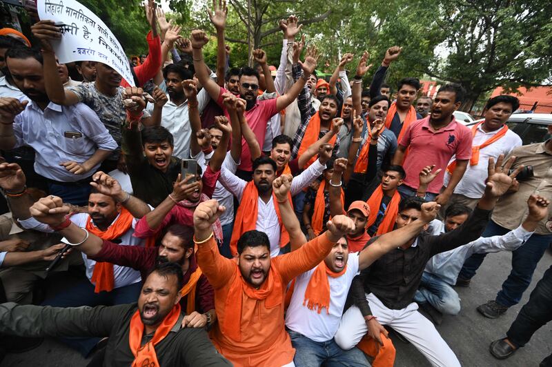 Protesters shout slogans during a protest against the recent killing of Hindu tailor Kanhaiya Lal in Udaipur, who was reportedly murdered by two Muslim men for supporting Nupur Sharma. AFP