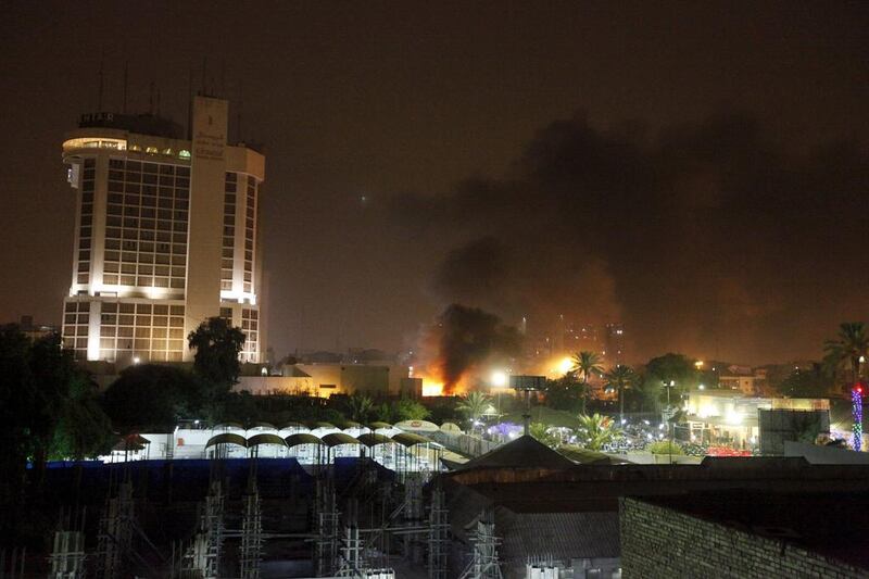 Smoke rises from the site of car bomb attack in Baghdad. Ahmed Saad / Reuters