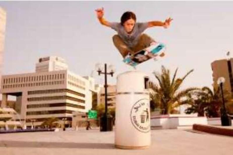 June 17, 2010 / Abu Dhabi / (Rich-Joseph Facun / The National) Evan Collisson (CQ), "ollies" a rubbish bin, Thursday, June 17, 2010 in Dubai. 