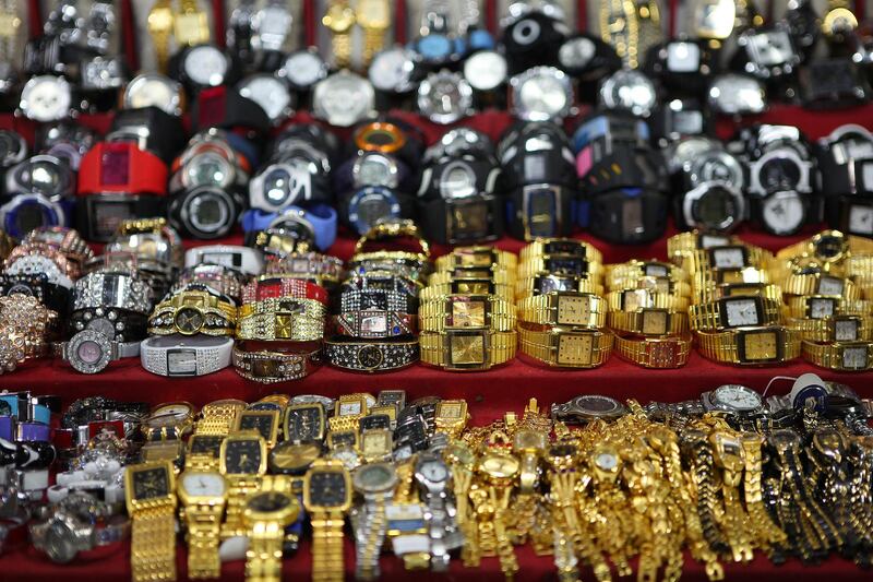 United Arab Emirates -Dubai- July 16, 2009:

ARTS & LIFE: Watches are for sale at the Dubai Souq located in Deira on Thursday night, July 16, 2009. Amy Leang/The National
 *** Local Caption ***  amy_071609_souq_10.jpg