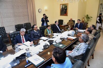 Pakistan's caretaker Prime Minister, Anwaar-ul-Haq Kakar, chairs a meeting of the National Security Committee in Islamabad on Friday. AP