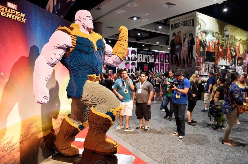 An oversized Lego action figure from Marvel's "Avengers: Infinity War" is displayed on the convention floor. AP Photo