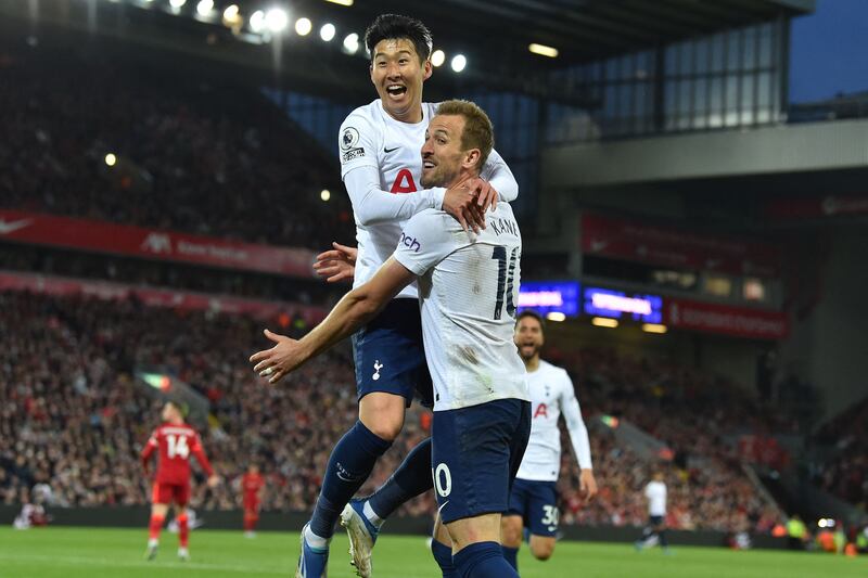 Son Heung-Min celebrates with Harry Kane after scoring Tottenham's opening goal against Liverpool. AFP