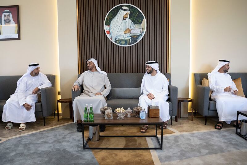 Sheikh Mohamed bin Zayed, Crown Prince of Abu Dhabi and Deputy Supreme Commander of the Armed Forces (2nd L), visits the home of Dr Omar Habtoor Al Derei, Director-General of the UAE Fatwa Council (3rd L). Seen with Hamad Habtoor Al Derei (L) and Sheikh Mohammed bin Hamad bin Tahnoon, adviser for Special Affairs at the Ministry of Presidential Affairs (R).