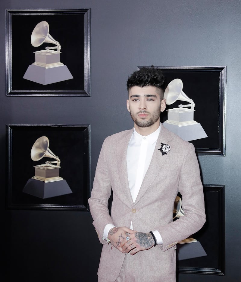 epa06482907 Zayn Malik arrives for the 60th annual Grammy Awards ceremony at Madison Square Garden in New York, New York, USA, 28 January 2018.  EPA-EFE/JASON SZENES