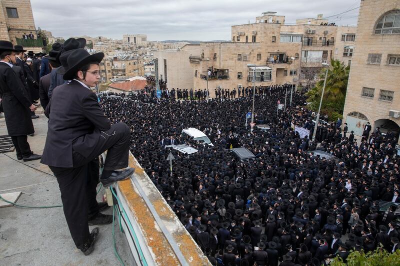Thousands of ultra-Orthodox Jews participate in the funeral for Rabbi Meshulam Dovid Soloveitchik in Jerusalem. AP