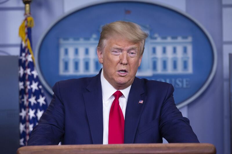 U.S. President Donald Trump speaks during a Coronavirus Task Force news conference at the White House in Washington, D.C., U.S., on Monday, April 6, 2020. A move by President Donald Trump to restrict exports of masks and other protective equipment needed to fight the Covid-19 pandemic is drawing a backlash from around the world even as a senior aide to the president said Monday the U.S. was “locked and loaded” at the border to prevent “profiteering” from exports by American companies. Photographer: Stefani Reynolds/CNP/Bloomberg