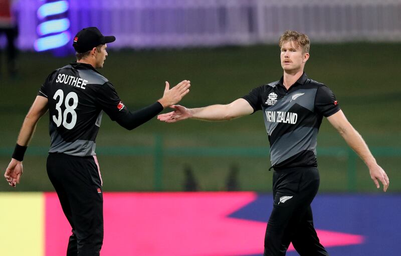 New Zealand's Jimmy Neesham celebrates taking the wicket of England's Liam Livingstone.