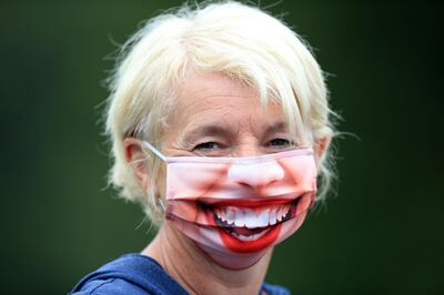 BIRMINGHAM, ENGLAND - JUNE 20: A spectator is seen wearing a face mask ahead of finals day during the Viking Classic Birmingham at Edgbaston Priory Club on June 20, 2021 in Birmingham, England. (Photo by Stephen Pond/Getty Images for LTA)