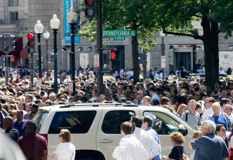 People crowd Pennsylvania Avenue in Washington, Tuesday, Aug. 23, 2011, as buildings were evacuated following an earthquake in the Washington area. The 5.9 magnitude earthquake centered northwest of Richmond, Va., shook much of Washington, D.C., and was felt as far north as Rhode Island and New York City.  (AP Photo/Charles Dharapak) *** Local Caption ***  East Coast Quake.JPEG-0c776.jpg