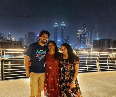 Rahul Thazheveettil with his mother Savithri Thazheveettil and wife Vinisha Rahul. Courtesy: Rahul Thazheveettil