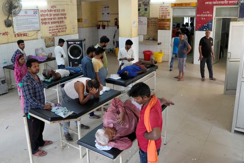 People suffering from heat-related ailments in the district hospital in Ballia, Uttar Pradesh state, India. All photos: AP