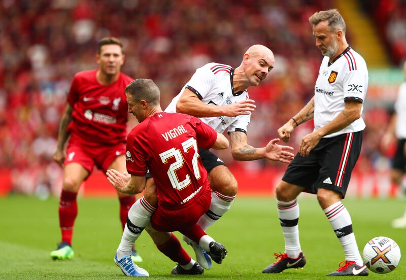 Liverpool's Gregory Vignal (L) and Manchester United's Darron Gibson battle for the ball. PA