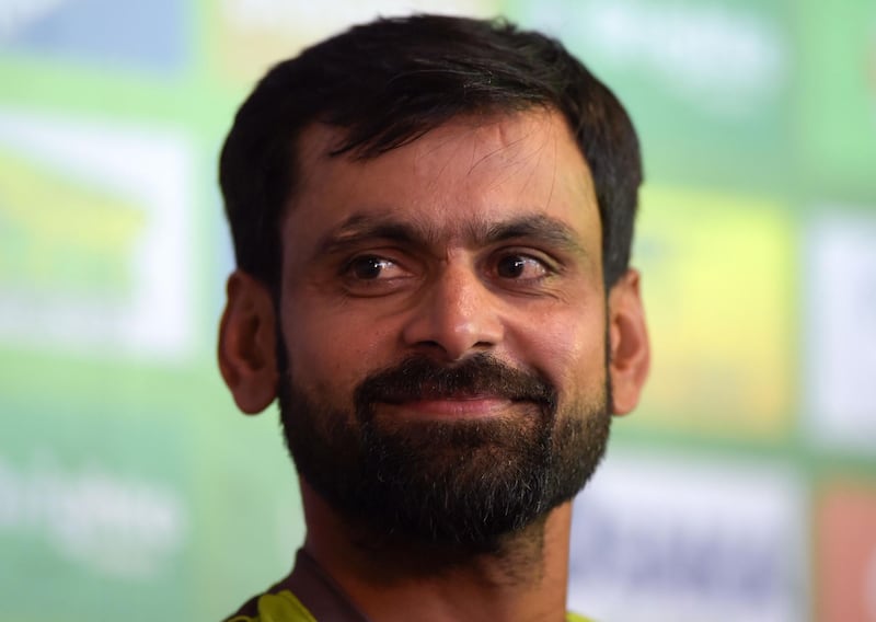 Pakistani cricketer Mohammad Hafeez announces his retirement from Test cricket during a press conference at the Sheikh Zayed International Cricket Stadium in Abu Dhabi on December 4, 2018. Struggling Pakistan opener Mohammad Hafeez said on December 4 he was retiring from Test cricket after the ongoing third and final match against New Zealand in Abu Dhabi. / AFP / AAMIR QURESHI
