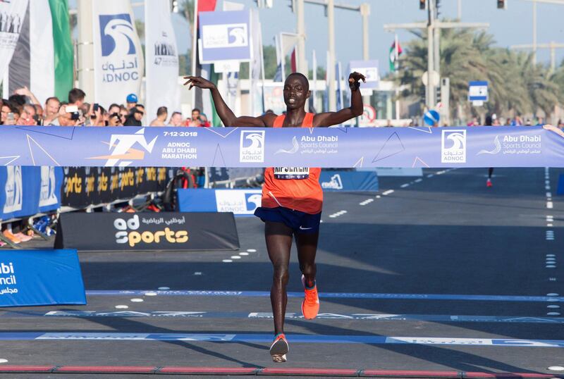 ABU DHABI, UNITED ARAB EMIRATES- Winner for men’s division 42km Kipserem  finishing the race at the ADNOC ABU Abu Dhabi Marathon.  Leslie Pableo for The National 