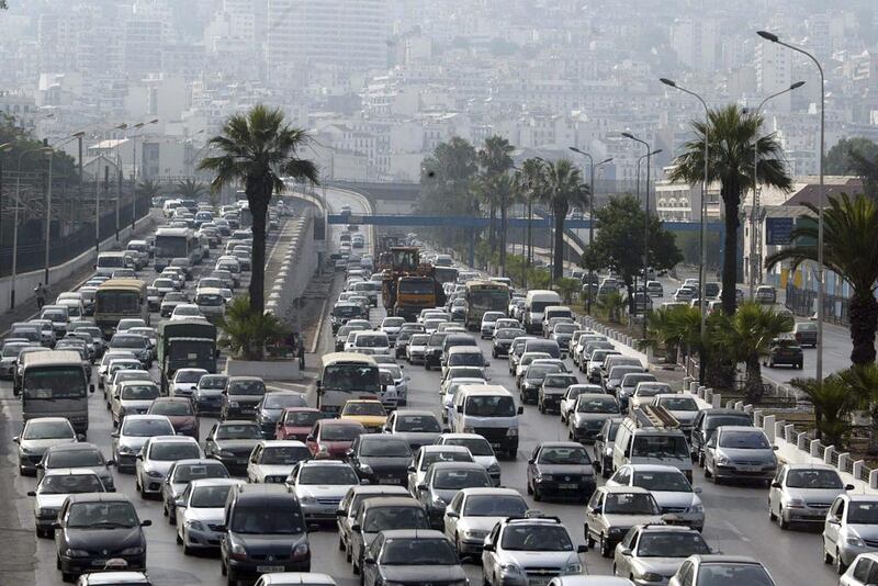 A traffic jam in Algiers, Algeria. In February, the government said it was considering cutting petrol subsidies as part of its economic reforms. Anis Belghoul / AP