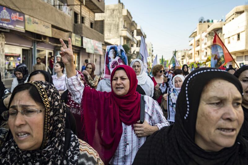 Syrian Kurds demonstrate against the Turkish assault against northeastern Syria, in the   town of Qamishli. AFP