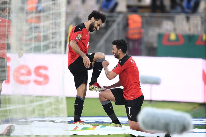 Egypt's Trezeguet celebrates with Mohamed Salah after the second goal. AFP