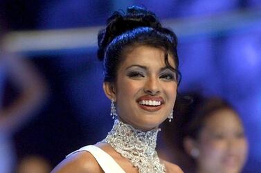 18-year-old Priyanka Chopra of India poses on stage during the Miss World final at the Millenium Dome in London, Thursday, November 30, 2000. Chopra won the contest. EPA