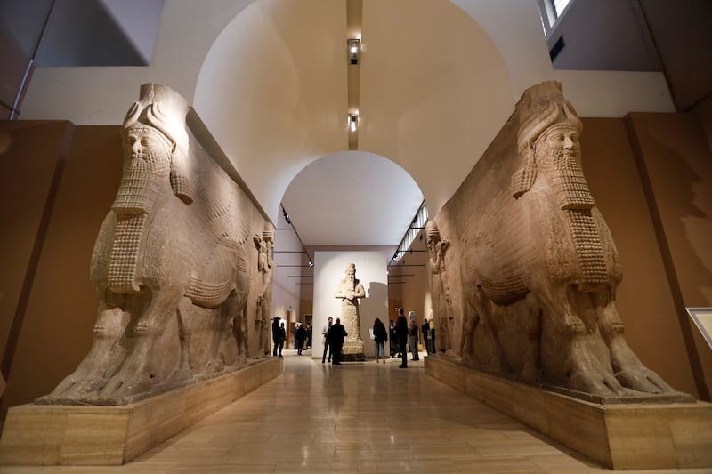 An ancient Assyrian human-headed winged bull statue is seen at the Iraqi National Museum in Baghdad, Iraq.  REUTERS