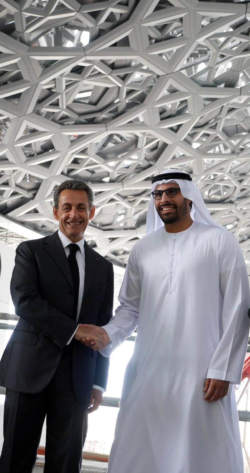 Abu Dhabi, 13 January 2016: HE Mohamed Khalifa Al Mubarak, Chairman of Abu Dhabi Tourism & Culture Authority (TCA Abu Dhabi) welcomed Nicolas Sarkozy, former President of the French Republic (2007-2012), in the presence of His Excellency Ali Majed Al Mansoori, the Chairman of Tourism Development & Investment Company, for a visit of the Louvre Abu Dhabi’s construction site this morning. The former president, who has close ties to the project since initiating its intergovernmental agreement in 2007, toured the site which is in its final stages.
 

Courtesy TDIC *** Local Caption ***  on14ja-sarkozy_louvre.jpg