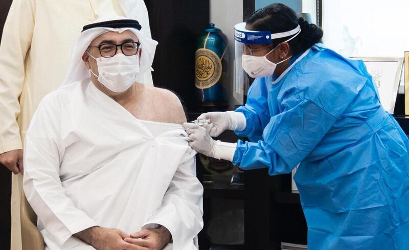 The UAE's health minister, Abdulrahman Al Owais, receives the Sinopharm vaccine.