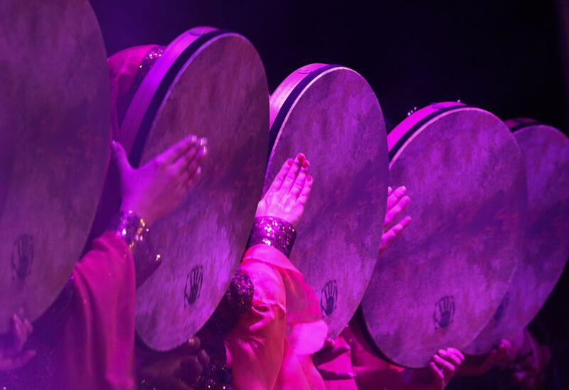 Sarmast musical group performers play the daf, a popular drumming instrument in Iran and Pakistan.