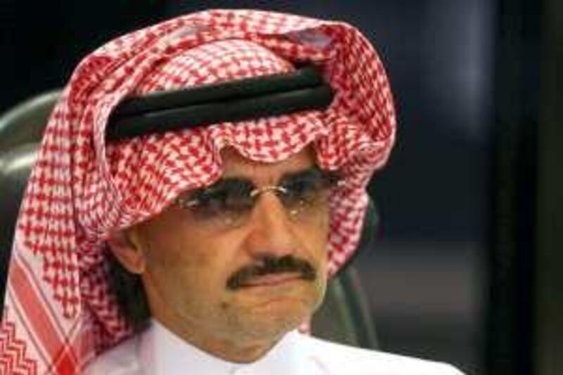 Saudi Prince Al-Waleed bin Talal attends a news conference in Riyadh August 30, 2009.   REUTERS/Fahad Shadeed    (SAUDI ARABIA POLITICS HEADSHOT ROYALS)