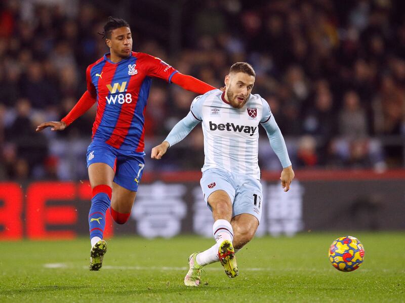 Crystal Palace's Michael Olise in action with West Ham United's Nikola Vlasic. Reuters