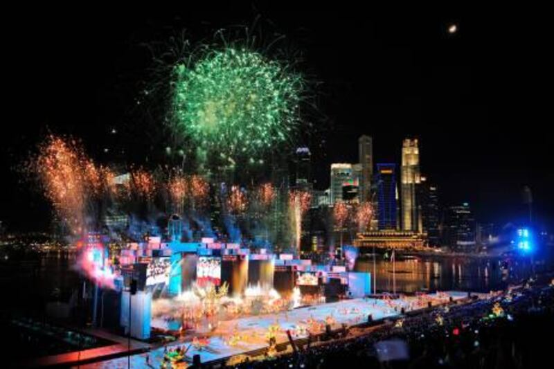 Fireworks explode at the opening ceremony of the Youth Olympic Games 2010 in Singapore on August 14, 2010. Some 3,600 14- to 18-year olds will compete in the 26 events in the August 14-26 Youth Olympics, with a simultaneous cultural and education programme running to teach them about Olympic values and global issues. AFP PHOTO/ROSLAN RAHMAN