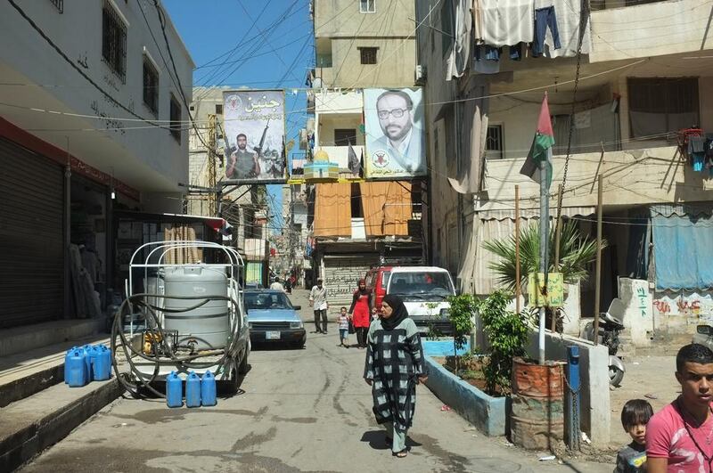 Inside Shatila refugee camp in Lebanon, where pictures of those killed during the conflict with Israel look over the streets. Kaveh Kazemi / Getty Images