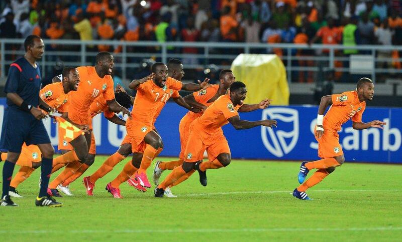 Ivory Coast players, from left to right, Siaka Tiene, Yaya Toure, Serey Doumbia, Kolo Toure and Serey Die react in celebration at the end of the penalty shootout win over Ghana in the Africa Cup of Nations final on Sunday. Gavin Barker / EPA