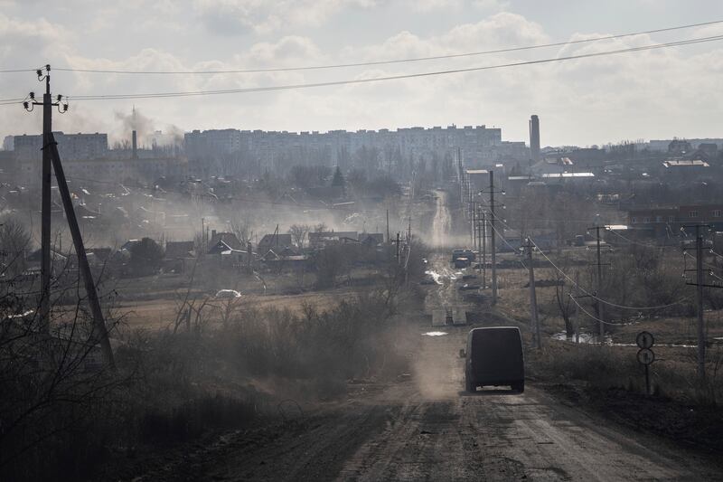 A Ukrainian police van of the White Angels unit on a road in Khromove, near Bakhmut. AP